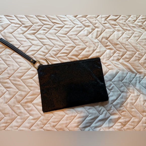 a new day Handbags - Like new faux fur Black wristlet Bag